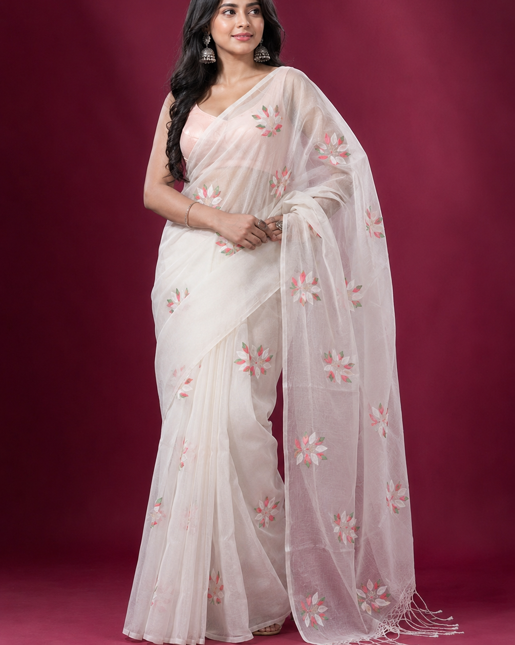 Elegant muslin saree crafted from the finest lightweight fabric, perfect for any occasion.